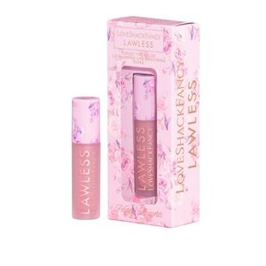 Happy Thoughts Lip Gloss pale lavender with a vanilla sugar flavor